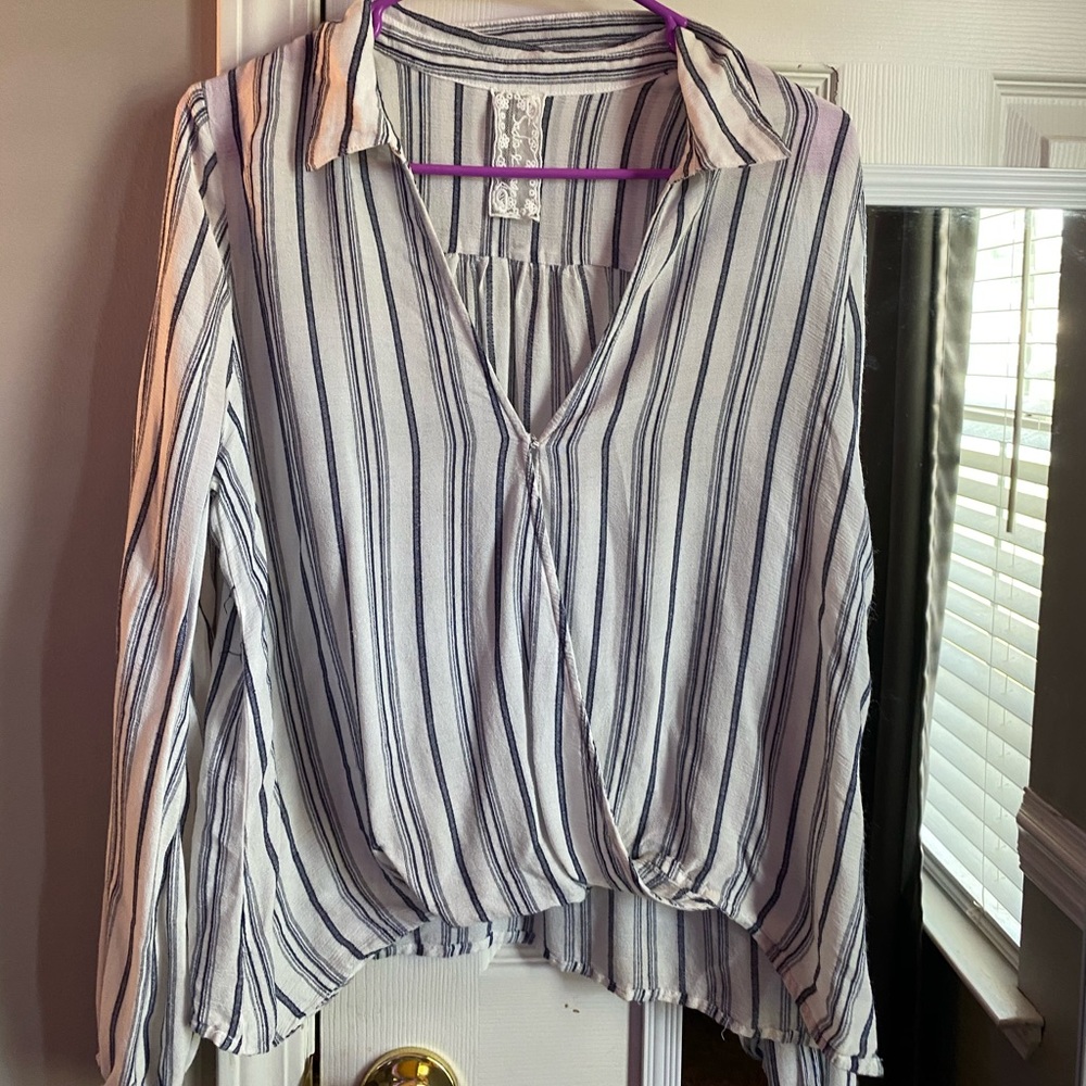 Striped, v-neck blouse.